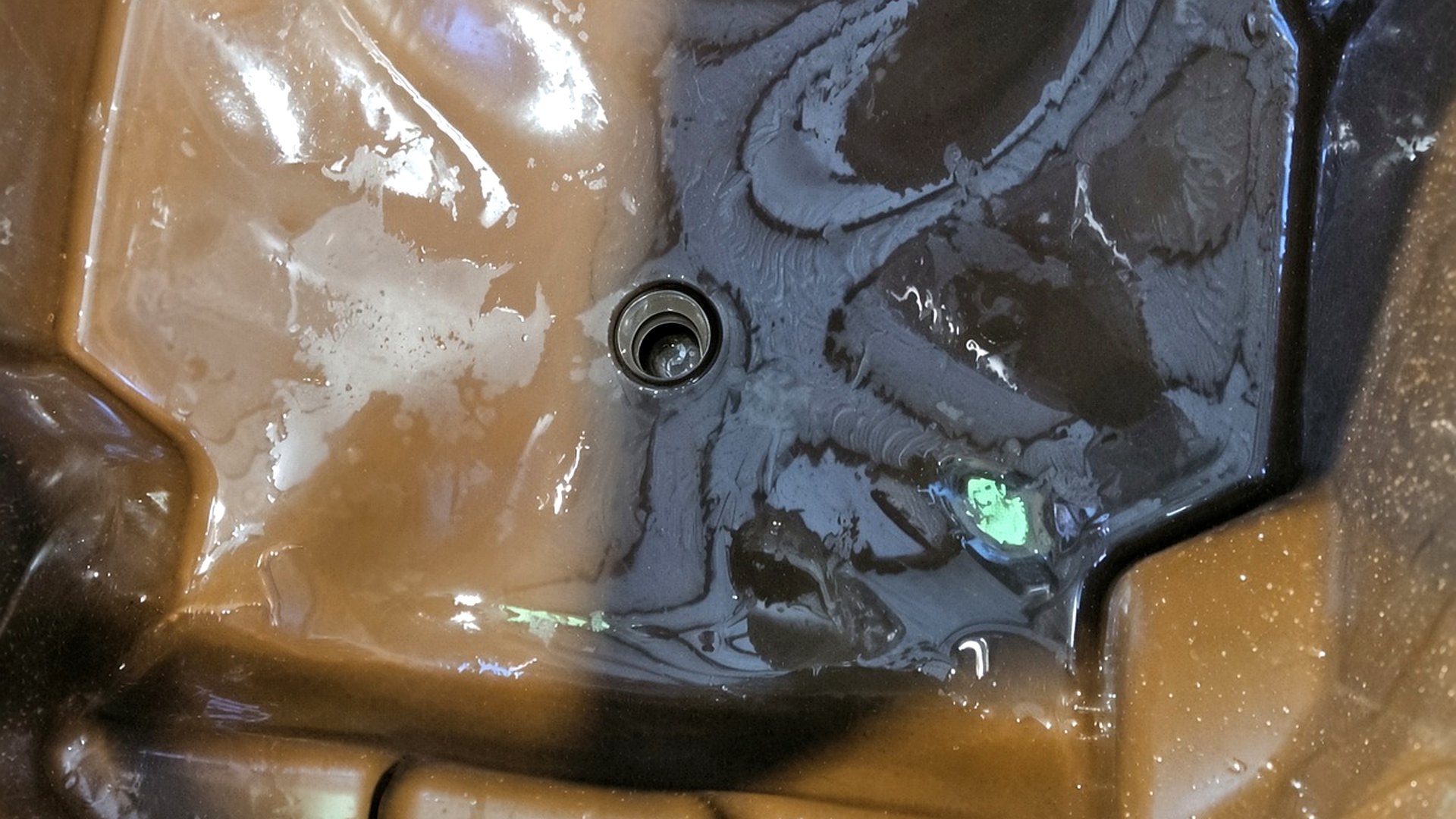 Wet interior of a 240 litre bin after the spinner wash